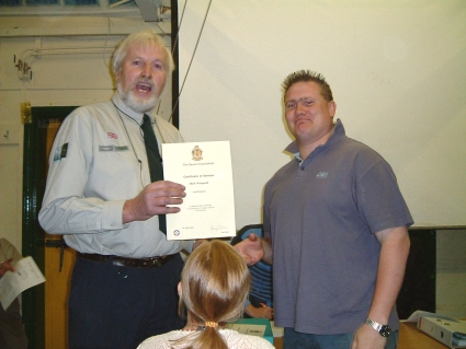 Mark Weingarth (Troop Helper) Receiving his Service Certificate from Ray Tucker