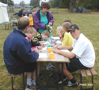 Group Camp 2002 - Challenge Camp Badge  being designed