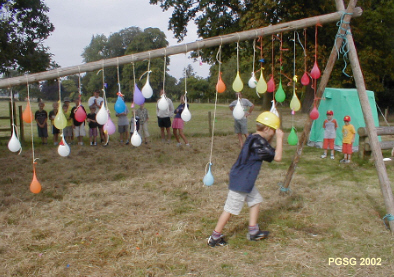 Group Camp 2002 - Challenge Hat has 6 inch Nail and you had to bust the ballon and get wet