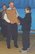 PG Scout presenting a framed xmas card signed by the berkshire contingent to the County Commissioner
